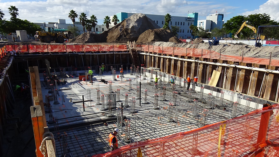 Proton theraphy equipment is shown during waterproofing before concrete placement begins